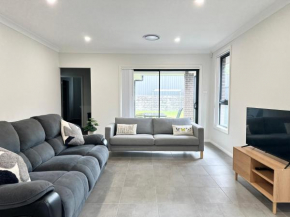 Convenient and Peaceful 4BR New House in Gregory Hills, Narellan